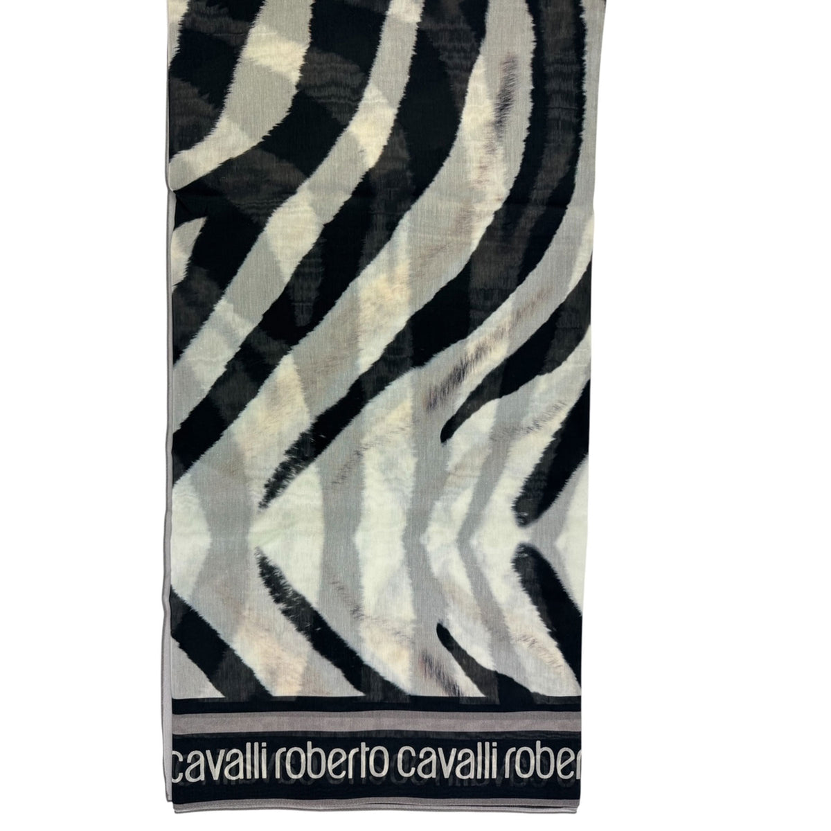 Scarf with zebra pattern and &#39;Cavalli Roberto Cavalli&#39; branding on a white background